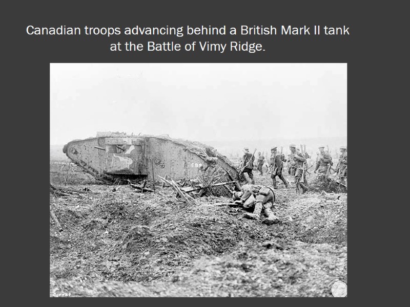 Canadian troops advancing behind a British Mark II tank at the Battle of Vimy